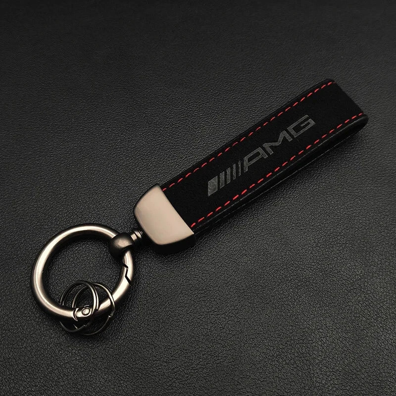AMG keychain on a black background